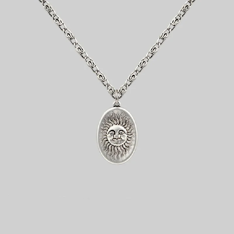 Charm Necklaces-DAWN. Symbolic Sun Face Necklace - Silver