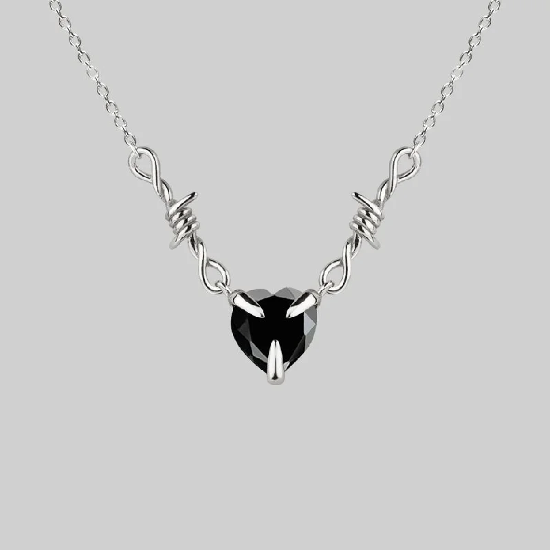 Talisman Necklaces-FATAL. Barbed Wire & Black Onyx Heart Necklace - Silver