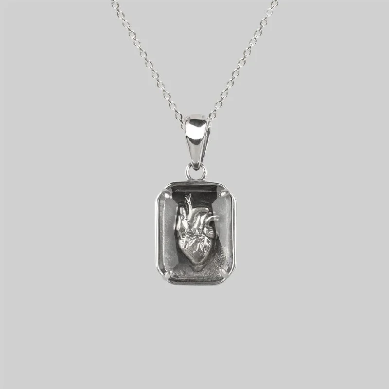 Diamond Necklaces-HEART KEEPER. Anatomical Heart Under Glass Necklace - Silver